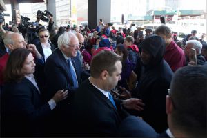 Democratic presidential candidate Sen. Bernie Sanders greets CWU workers at a Verizon workers picket line Wednesday in Brooklyn. AP Photo/Mary Altaffer
