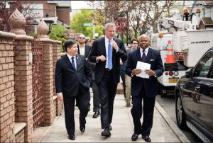 Mayor Bill de Blasio (center) came to Bay Ridge Monday to talk about reducing water bills, but faced questions on campaign finance controversies. Photo by Demetrius Freeman/Mayoral Photography Office