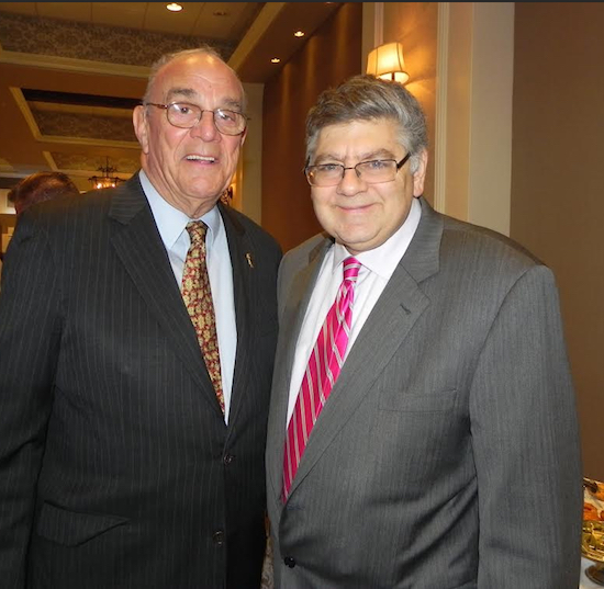 The new $15 an hour minimum wage is “going to lose jobs for young people,” Mike Long (left) predicts. Long is pictured with Brooklyn Conservative party Chairman Jerry Kassar. Eagle file photo by Paula Katinas