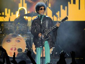 In this 2013 file photo, Prince performs at the Billboard Music Awards at the MGM Grand Garden Arena in Las Vegas. Photo by Chris Pizzello/Invision/AP, File