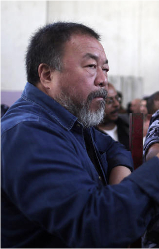 Ai Weiwei celebrates his birthday today. AP Photo/ Khalil Hamra