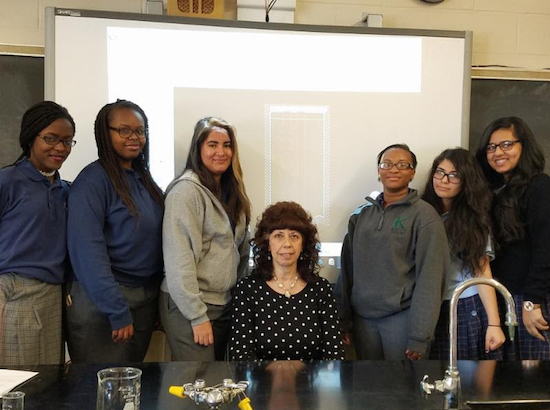 Led by moderator Roseann Daniello (seated center), members of the Science Club at Bishop Kearney High School came up with the designs for five experiments for NASA to conduct. Photo courtesy of Bishop Kearney High School