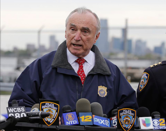 New York City Police Commissioner William Bratton speaks to the media after the NYPD crushed about 70 confiscated motorcycles and all-terrain vehicles at the Erie Basin tow pound in Red hook on Tuesday. AP Photos/Kathy Willens