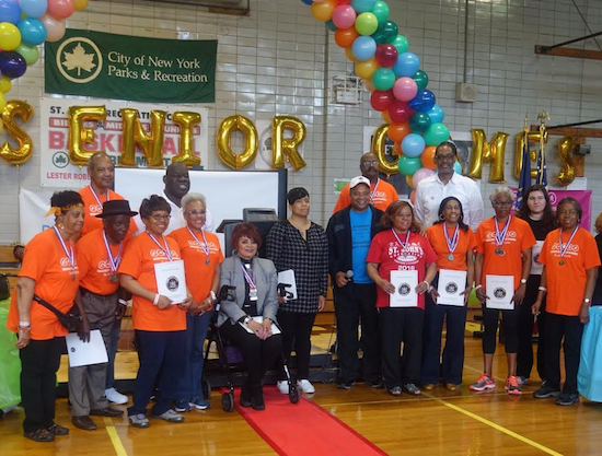 State Sen. Jesse Hamilton and City Councilmember Robert Cornegy are picture with Central Brooklyn Senior Games medal winners. Photo courtesy of Sen. Hamilton’s Office