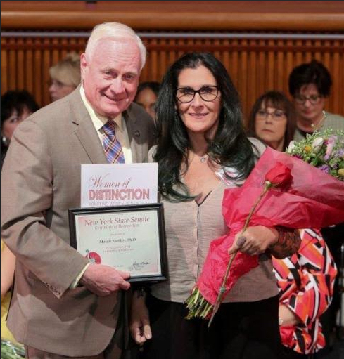 State Sen. Marty Golden presents the Woman of Distinction Award to Dr. Mardie Sheiken in Albany. Photo courtesy of Golden’s office