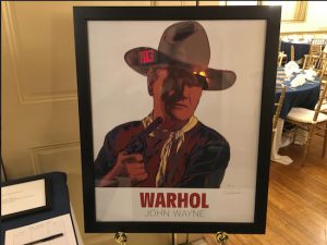 A John Wayne painting by Andy Warhol was auctioned off at the event. Eagle photos by John Alexander