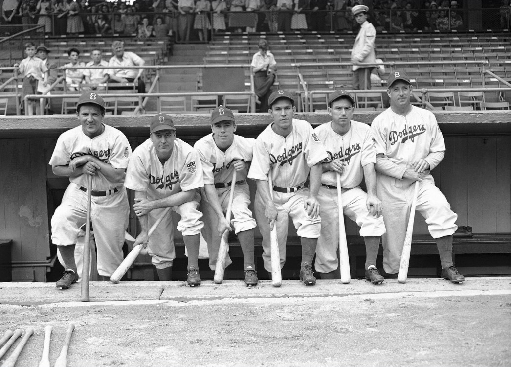 Joe Medwick (far left) poses with fellow Brooklyn Dodgers in June 1942. His teammates (second from left to right) are Billy Herman, Pee Wee Reese, Pete Reiser, Mickey Owen and Whitlow Wyatt. AP photo/Tom Sande 
