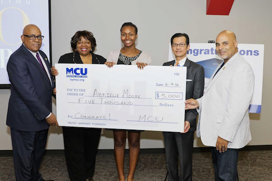 Brooklyn Friends School senior Abrielle Moore was recognized for receiving Municipal Credit Union's Julian I. Garfield Memorial Scholarship. Presenting the award to Abrielle (center) were (from left): MCU First Vice Chair James Durrah, Director Beryl Major, President/CEO Kam Wong and Assistant Treasurer Mario Matos Jr. Photo courtesy of MCU