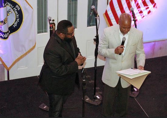 Bishop Hezekiah Walker Receives a Proclamation from Brooklyn Borough President Eric L. Adams. Brooklyn Eagle Photo by Francesca N. Tate