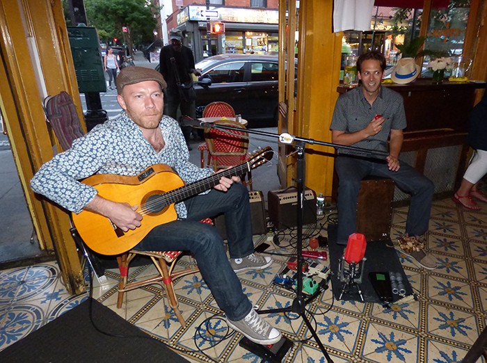 Guitarist Francois Wiss (left) and Reid Andres, who plays cajon and percussion, will be performing on Bastile Day at Bar Tabac.