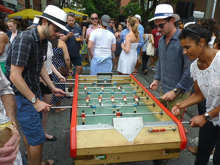 Pétanque is not the only game on Smith Street on Bastille Day. Photo by Mary Frost