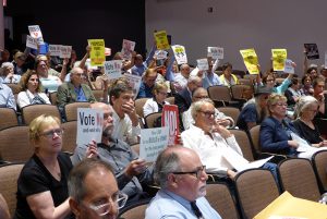 An unhappy crowd filled Dibner Auditorium at MetroTech on Tuesday for Brooklyn Bridge Park Corp.’s vote to approve the controversial towers at Pier 6. Photos by Mary Frost