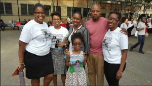 District 16 in Bedford-Stuyvesant held its inaugural Literacy Fair in Jesse Owens Park on Thursday. Pictured from left: Superintendent Rahesha Amon, Principal Leadership Facilitator Yolanda Martin, Family Advocate Camelia Brogden-Cruz, Noel Calloway, Parent of Kellen Calloway, Principal Nakia Haskins, Kellen Calloway, student and author of “Runaway Princess.” Photos courtesy of District 16.