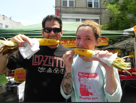 Michael Arkous and Anita Mercado munch on delicious corn at last year’s festival. Eagle file photo by Paula Katinas