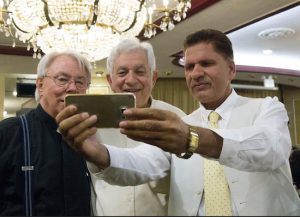 An Abrahamic selfie: Having fun was another vital part of Tuesday’s iftar. Here, Fr. Michael Perry, New York State Democratic District Leader Jacob Gold and Javed from the NYPD’s 70th Precinct enjoy each other’s company. Eagle photo by Francesca N. Tate