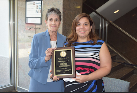 Law secretary Lissette Morales (left) was named Employee of the Year during a ceremony at the Brooklyn Supreme Court. Morales is pictured with Hon. Laura Jacobson. Eagle photos by Rob Abruzzese