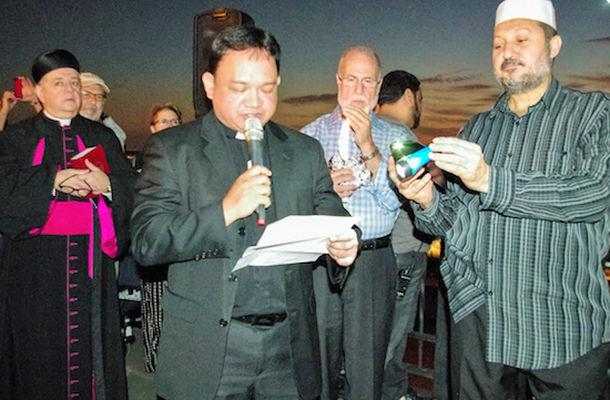 Pictured is one of the many prayer vigils on the Promenade that the Brooklyn Heights Clergy Association has led in recent years. This gathering is from a 2014 September 11 commemoration. Left to right: Monsignor James Root; Fr. Joseph Hugo and Dr. Ahmad Jaber and Imam Abdallah Allam, both representing the Dawood Mosque on State Street. Brooklyn Eagle File Photo by Francesca N. Tate