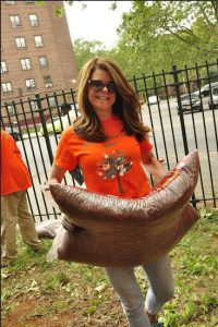 MaryAnne Gilmartin, president and CEO of Forest City Ratner Companies, joins Rebuilding Together NYC to renovate the Gotham Professional Arts Academy in Bedford-Stuyvesant on June 17. Photo courtesy of Forest City Ratner Companies