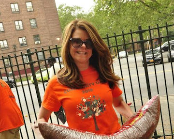 MaryAnne Gilmartin, president and CEO of Forest City Ratner Companies, joins Rebuilding Together NYC to renovate the Gotham Professional Arts Academy in Bedford-Stuyvesant on June 17. Photo courtesy of Forest City Ratner Companies