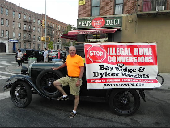Bob Cassara, founder of the Brooklyn Housing Preservation Alliance, used a vintage auto to get his message across at the recent Summer Stroll on 3rd event in Bay Ridge. Eagle photo by Paula Katinas