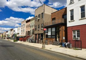 Welcome to south Bushwick, where industrial buildings are intermingled with quaint rowhouses such as the ones seen here on Cooper Street. Eagle photos by Lore Croghan