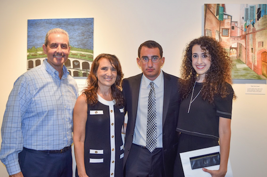 Joseph DeCandido (second from right) poses with his family during the opening of his solo show at Brooklyn’s federal courthouse. Pictured from left: Joseph’s father Frank DeCandido, his mother Jennie DeCandido, Joseph and his sister Elizabeth DeCandido. Eagle photos by Rob Abruzzese