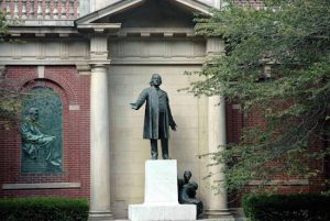 Henry Ward Beecher, famed preacher, abolitionist and founder of Plymouth Church, is depicted in two statues in Downtown Brooklyn: pictured here in the Plymouth Garden; and in Columbus Plaza, between the Post Office and State Supreme Court. Columbus Park’s Beecher statue is by sculptor John Quincy Adams Ward (1830–1910). Eagle file photo by Phoebe Neidl