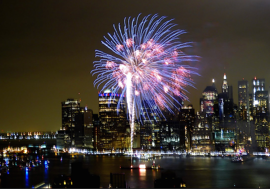 Macy's fireworks light the night in this view from on high in Brooklyn Heights. Eagle photo by Mary Frost