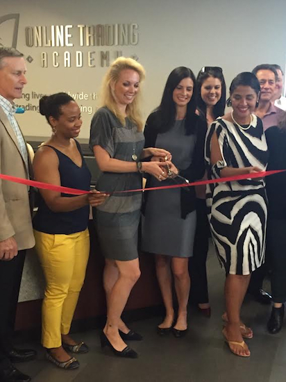 Representatives of the Online Trading Academy cut the ribbon to mark the opening of a new location in downtown Brooklyn. Photo courtesy of Online Trading Academy