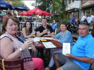 Sheila Scire, Jane Peck, Brian Kidney, Carol Kidney and Mike Scire (left to right) stopped for dinner at Salud’s sidewalk café. Eagle photos by Paula Katinas