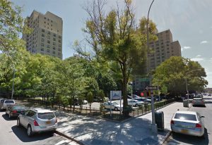 The city has issued an RFP for two mixed-income buildings to be developed on spare land in the Wyckoff Gardens public housing project in Boerum Hill. Shown above: One of the new buildings will be built where a parking lot now stands at the corner of Nevins and Wyckoff streets. Image data © Google Maps