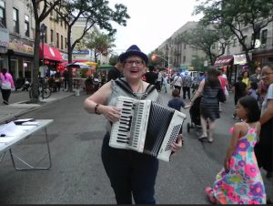 Ellen Lindstrom entertained the crowds with her lively accordion at the Summer Stroll on 3rd event on Aug. 5. Eagle photos by Paula Katinas