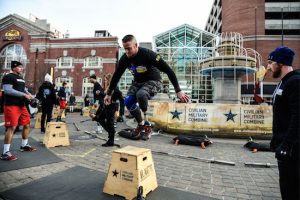 A contestant jumps over a box in the obstacle course in a previous Civilian Military Combine event. Photos courtesy of Civilian Military Combine LLC
