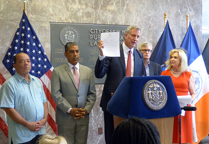Mayor Bill de Blasio, and officials on Monday urged the federal government to release the full $1.9 billion in emergency funding requested by President Barack Obama to combat the Zika virus. (From left) State Sen. Martin Dilan, state Sen. Adriano Espailat, Mayor Bill de Blasio, Assemblymember Brian Cavanaugh and Rep. Carolyn B. Maloney. Photo by Mary Frost