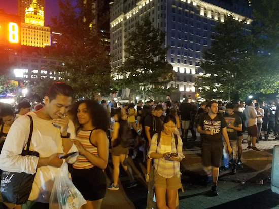 Hundreds of people played Pokémon GO in Grand Army Plaza in Manhattan last week. Photo by Wajeeh Ullah