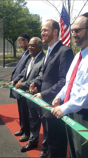 Councilmember David Greenfield (second from right) cuts the ribbon with Community Board 12 District Manager Barry Spitzer, Brooklyn Parks Commissioner Kevin Jeffrey and state Sen. Simcha Felder (left to right) to mark the reopening of Gravesend Park. Photos courtesy of Greenfield’s office