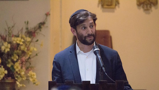 Rabbi Seth Wax is pictured speaking at Mount Sinai’s Yom HaShoah observance in May. Eagle Photo by Francesca N. Tate