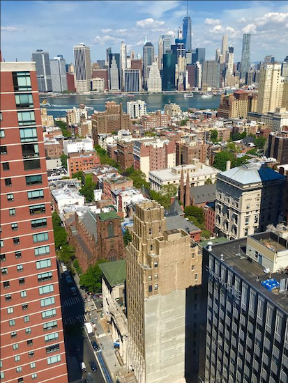 Two Brooklyn Heights buildings will be considered for landmark designation: The yellow building, center, which is 185 Montague St., and the building to its left, 181-183 Montague St. Eagle photos by Lore Croghan