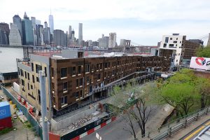 A Brooklyn judge on Thursday threw out a lawsuit attempting to block construction of a section of the Pierhouse residential/ hotel complex in Brooklyn Bridge Park. The structure partially blocks the protected view of a section of the Brooklyn Bridge from the Promenade. Photo by Mary Frost