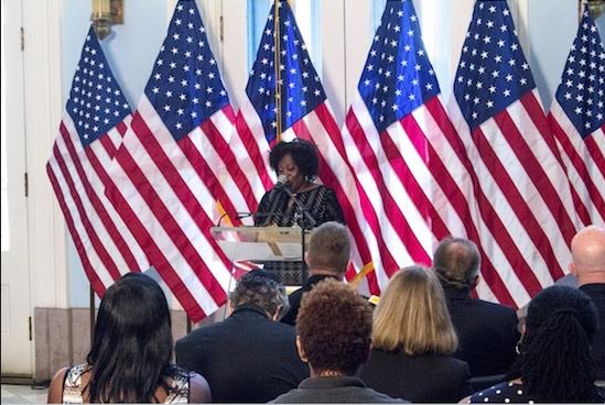 Trudi Aiken, aunt of Sept. 11 victim Terrance Andre Aiken, reads her poem “Reflections” at last year’s Borough Hall 9/11 Remembrance Service. Eagle file photo by Francesca N. Tate