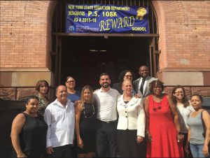 Councilmember Rafael Espinal (center) on Friday announced that 27 schools in his district are getting $17.45 million for tech and infrastructure upgrades. Photo courtesy of Councilmember Espinal’s Office