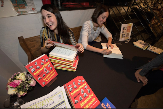 Alexandra Kleeman (left) signs her book, “Intimations,” alongside Liz Moore, who signs her novel “The Unseen World.” Eagle photos by Andy Katz
