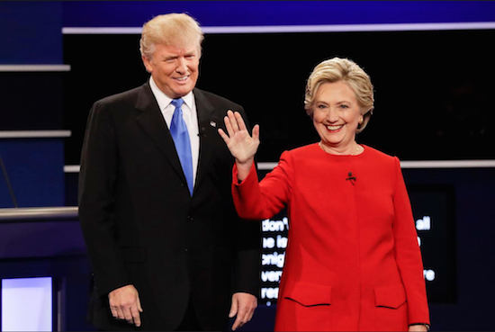 Republican presidential nominee Donald Trump and Democratic presidential nominee Hillary Clinton are introduced during the presidential debate at Hofstra University in Hempstead, N.Y., on Monday. AP Photo/David Goldman