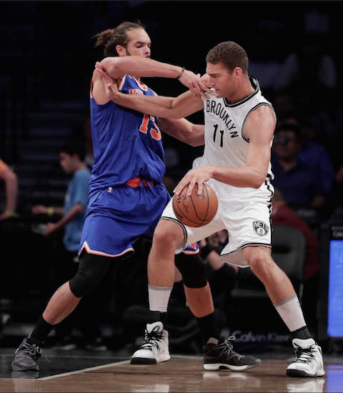 Brook Lopez is still trying to find his way in Atkinson’s motion offense. AP photo