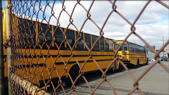 Shown are school buses parked in the Red Hook lot of Jofaz Transportation Co. Drivers and attendants have voted to authorize a Nov. 1 strike that could inconvenience more than 12,000 NYC schoolchildren and their parents.  Eagle photo by James Harney