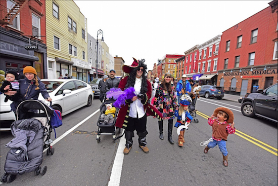 Costumed parents and kids fill Manhattan Avenue in Greenpoint, for the 13th annual Town Square Halloween Parade. Eagle photos by Andy Katz