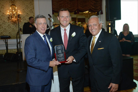From left to right:  TD Bank’s NYC President Peter Meyer and National Grid President Ken Daly stand with former KeySpan president Bob Catell as they accept their awards at Helen Keller Services’ annual gala at the Garden City Hotel on Sept. 29. Photos courtesy of Hellen Keller Services
