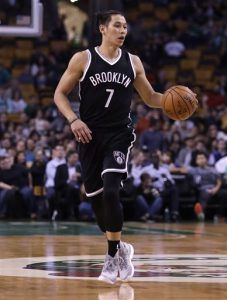 Brooklyn Nets guard Jeremy Lin dribbles during the first quarter of a preseason NBA basketball game in Boston on Monday. AP Photo/Charles Krupa