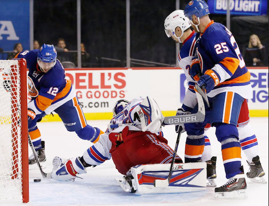 Josh Bailey’s goal with 22 seconds remaining in overtime lifted the Islanders to a 3-2 victory over the rival Rangers at Barclays Center on Tuesday night. AP photo