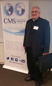 Most Rev. Nicholas DiMarzio, bishop of Brooklyn, delivered opening remarks and moderated a panel discussion on immigration studies at the Center for Migration Studies' 2016 Academic & Policy Symposium. Eagle photo by James Harney